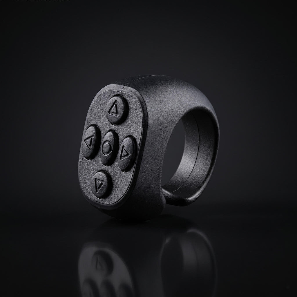Black ring remote control with directional buttons for operating the electronic moving eyes mask